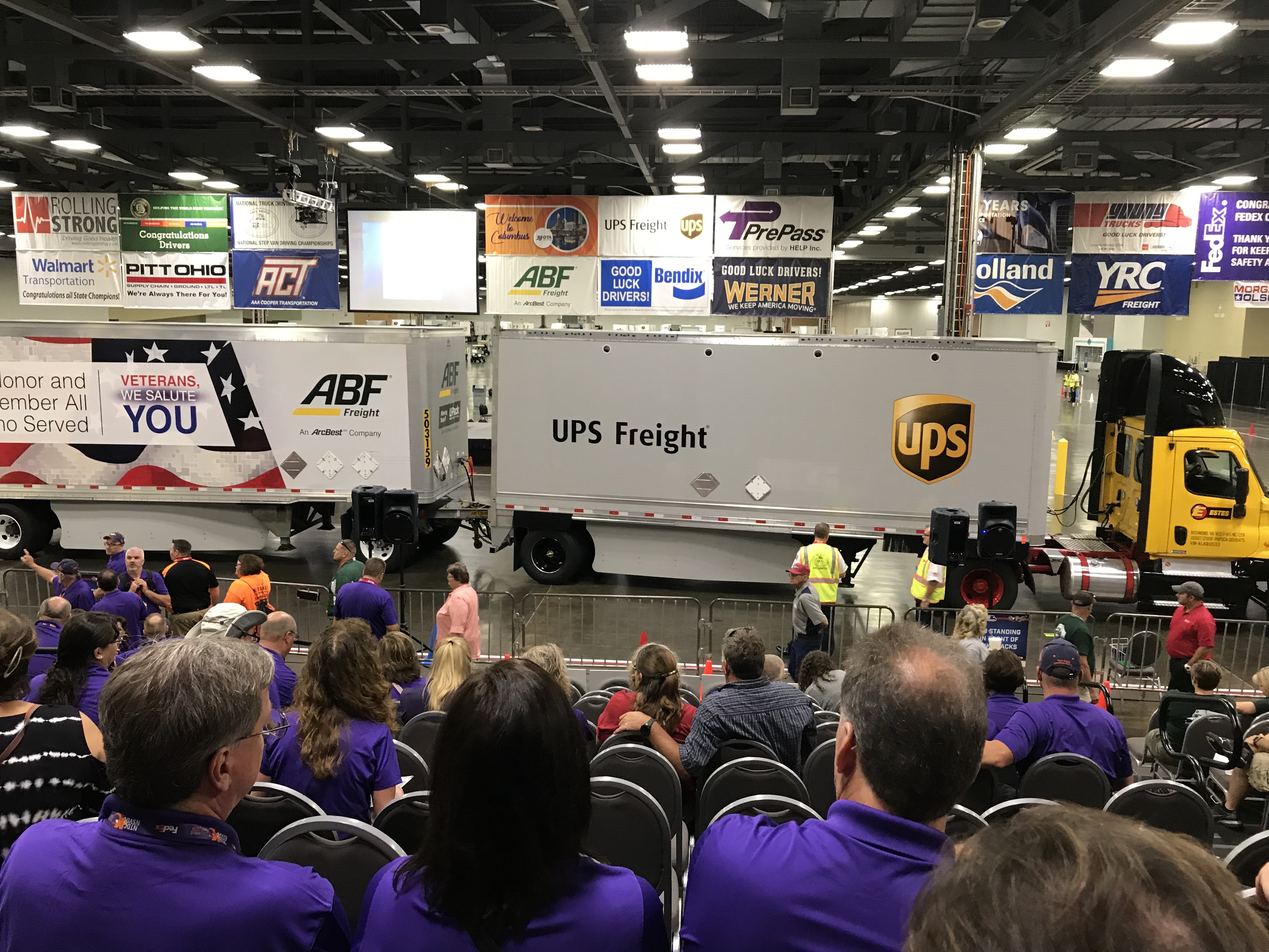 A driver competing in the "doubles" class passes in front of the grandstand